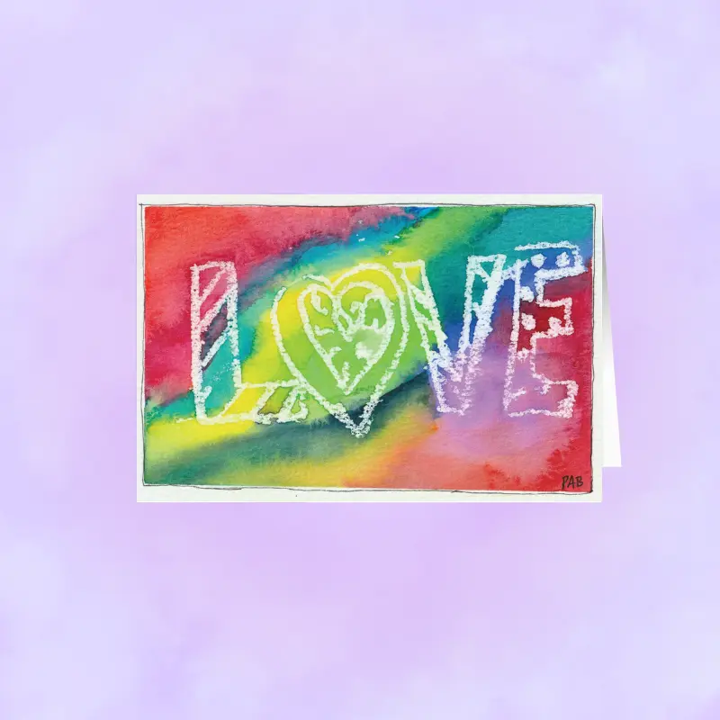 Close-up of a vibrant, hand-designed tie-dye artist print on matte premium stationery.