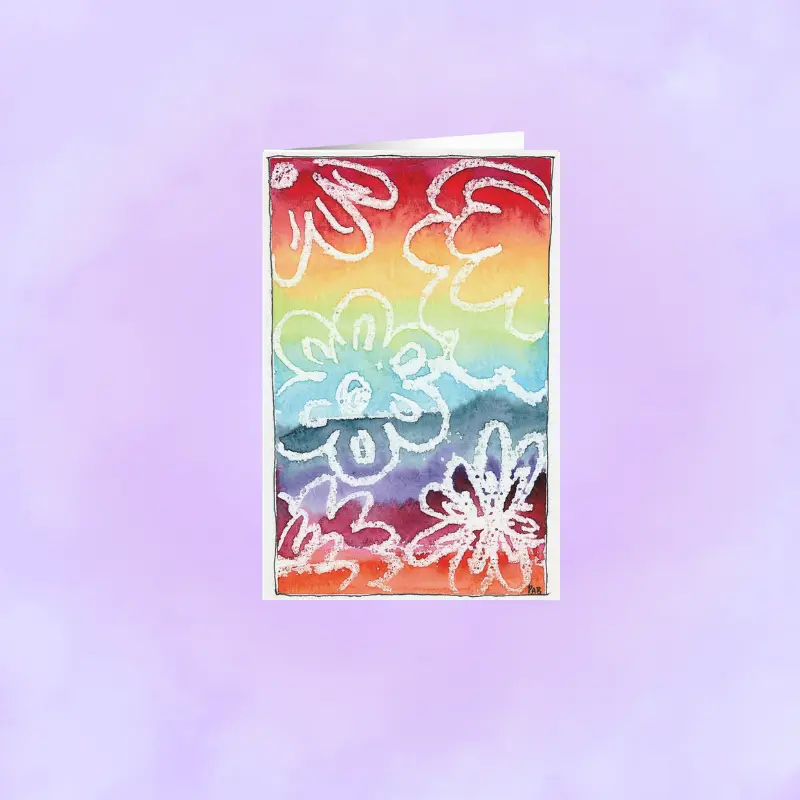 Close-up of a vibrant, hand-designed tie-dye artist print on matte premium stationery.